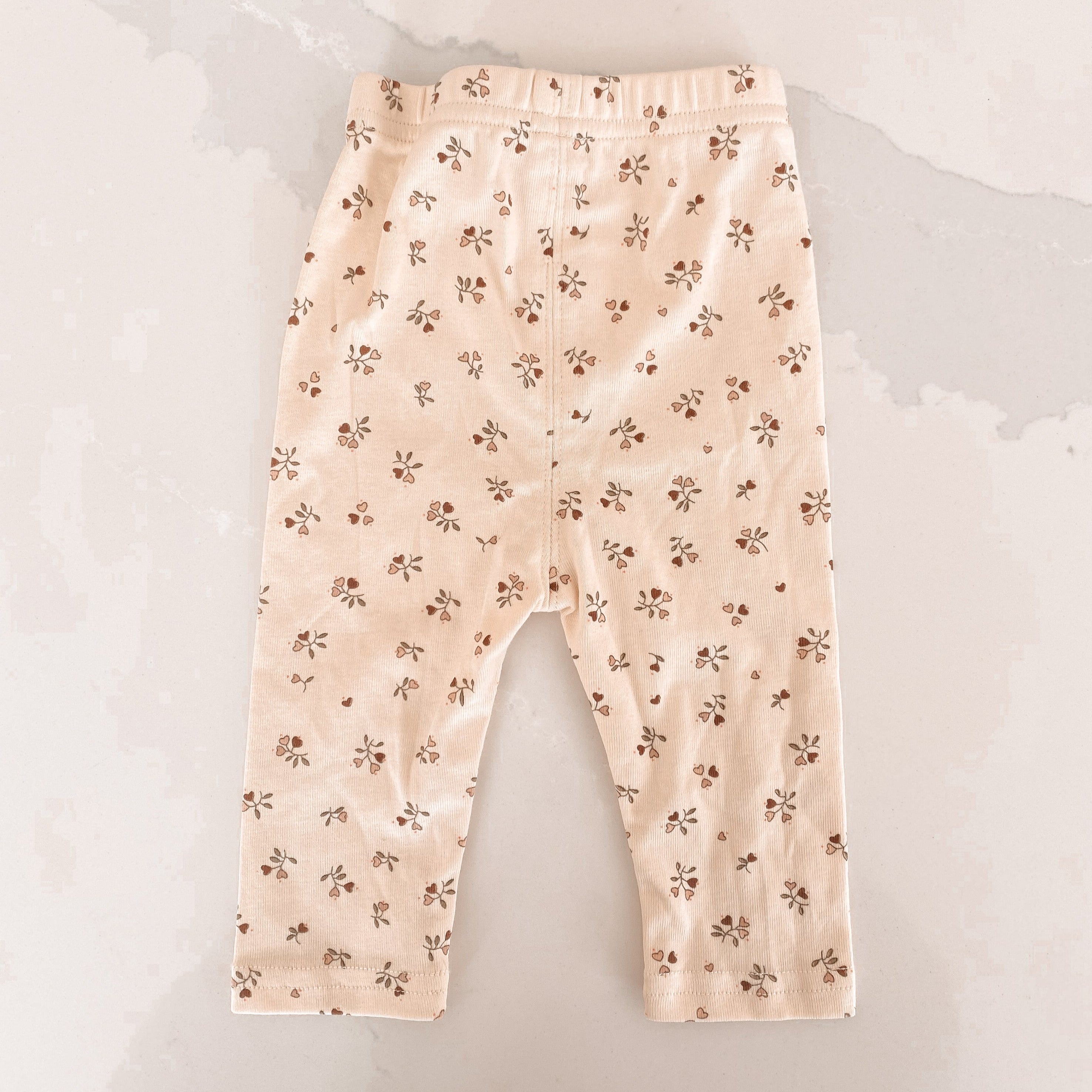 Pantalon beige fleuri